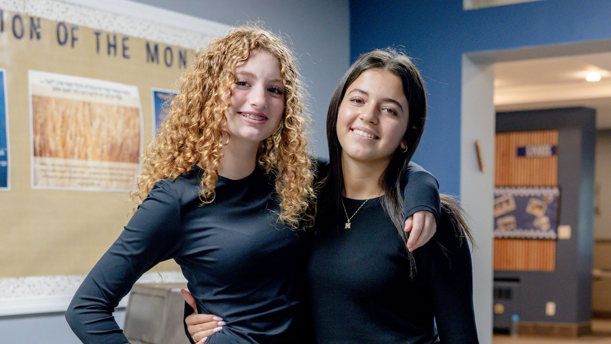 Two WHHS students in the school hallway