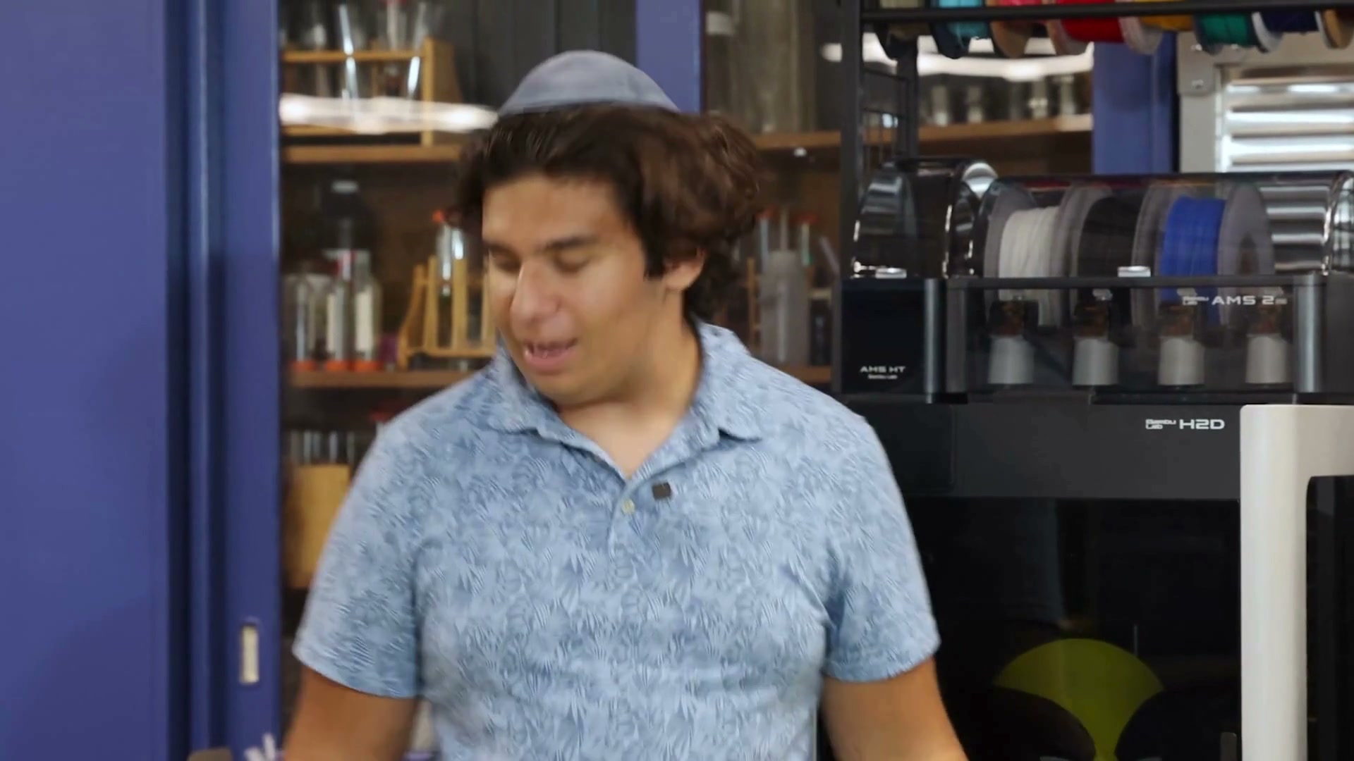 A WHHS student at the 3D printers